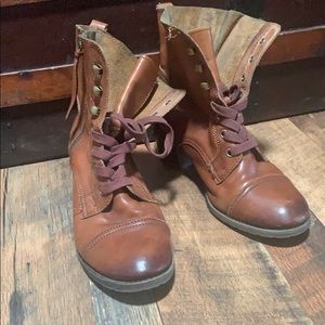 Brown leather distressed worn boots